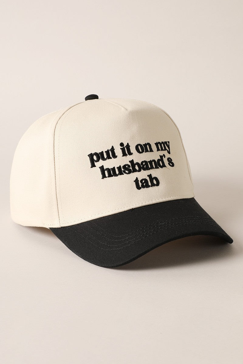 Put It On My Husbands Tab Trucker Hat