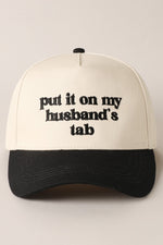 Put It On My Husbands Tab Trucker Hat